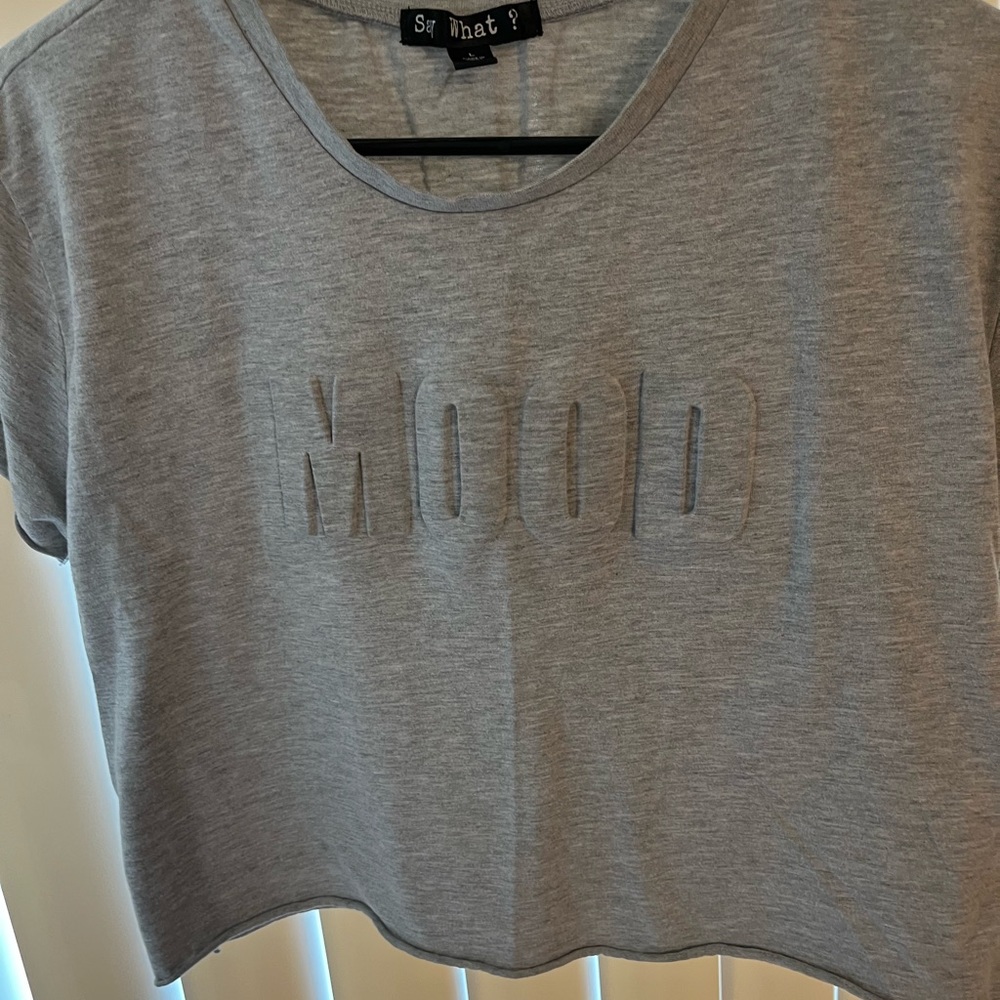 This is a gray crop top from say what